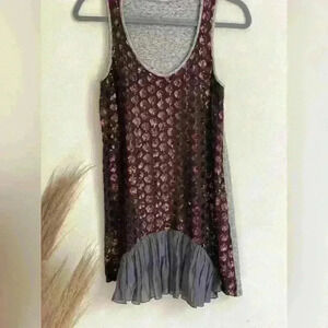 Unique elongated sequence top from a European luxury brand